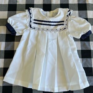 White and Navy Baby Dress with Lace Trim